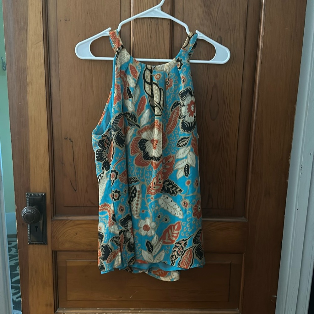 Teal blue halter neck tank top with floral pattern